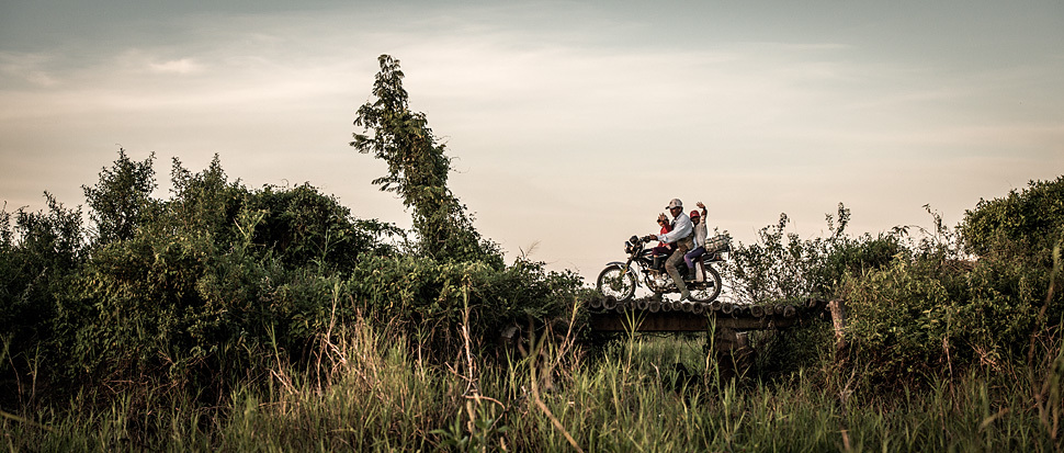 Familie auf dem Moped
